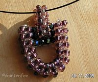 Hufeisen-Variante mir rosa Perlen